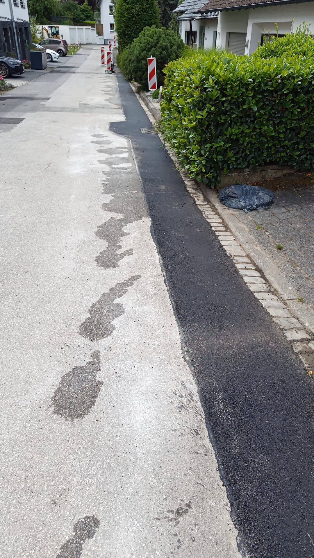 Aufmaß der Schutzrohrquerung mit Messlatte